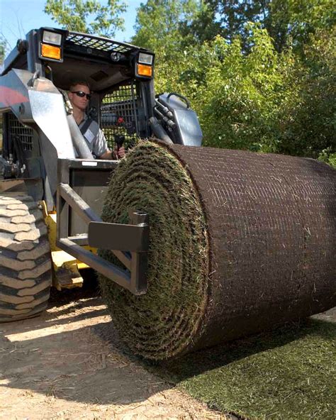 laying sod with skid steer|quick turf sod roller.